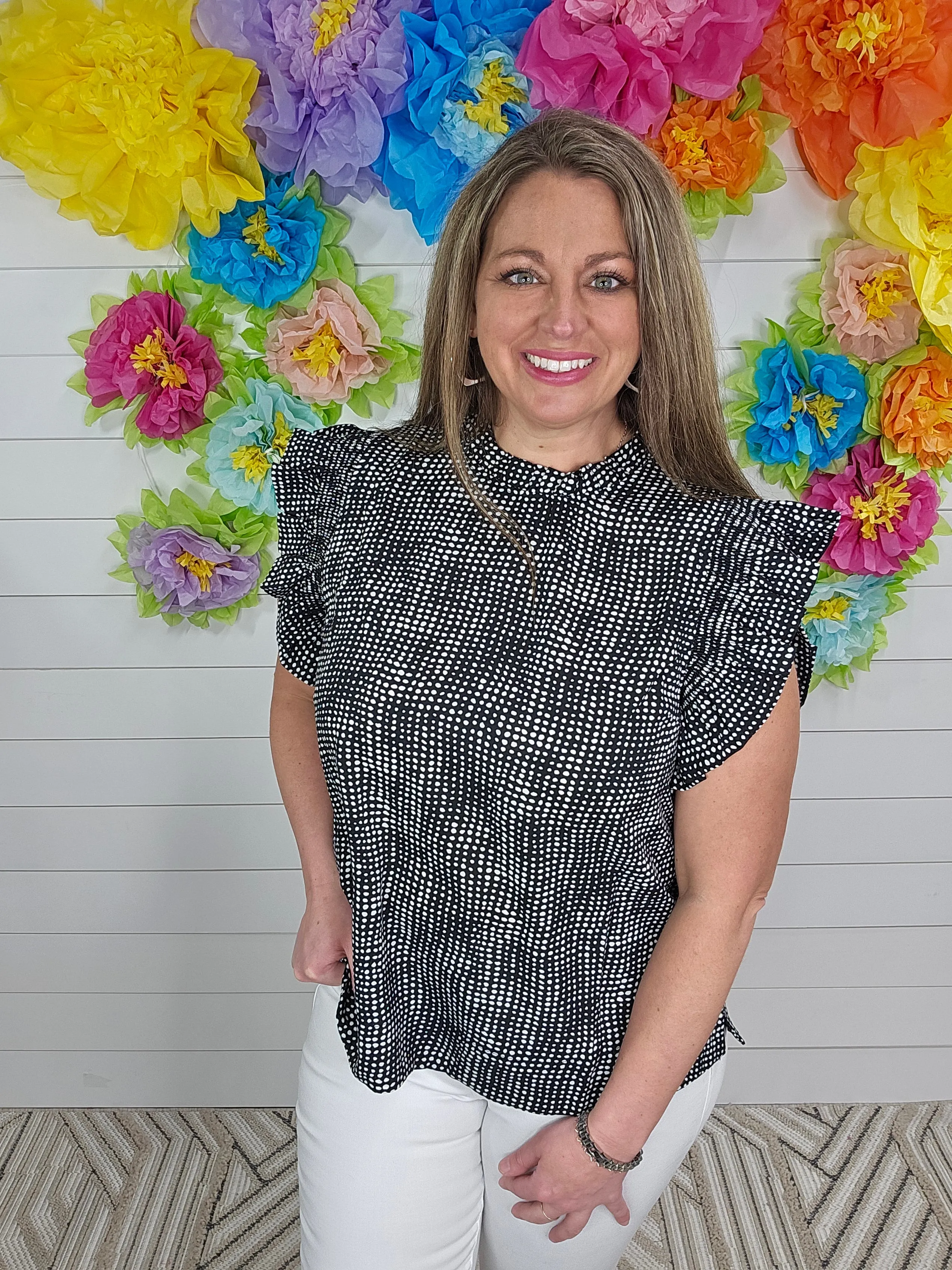 BLACK IRREGULAR DOT PRINT TOP WITH A FRILL MOCK NECKLINE